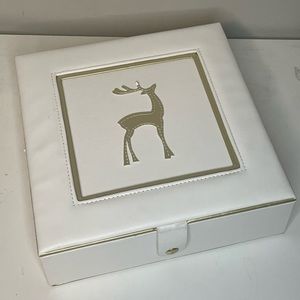 White beautiful jewelry box to keep things organized and clean.